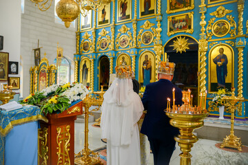 wedding of a loving couple in the Russian church