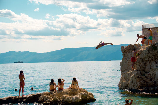 Jumping Off A Cliff. Rijeka, Croatia