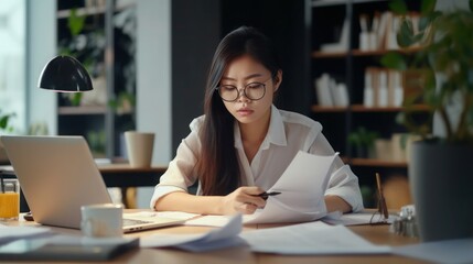 Serious business woman working in office