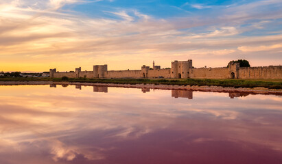 Historical walled town Aigues-Mortes in Camargue region, France - obrazy, fototapety, plakaty
