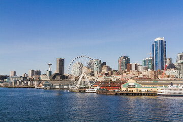 Seattle's Majestic Skyline and Waterfront with Ferris Wheel