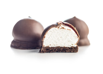 Chocolate covered marshmallows. Sweet dessert isolated on white background.