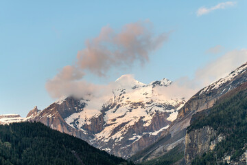 Seen from Kandersteg, Switzerland, sunset on snowcapped peak of the Breithorn (3,780 m) in the...