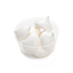 Meringue cake in a plastic container isolated on a white background.