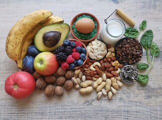 Serotonin, dopamine and brain boosting foods. Assortment of food for good mood, happiness, better...
