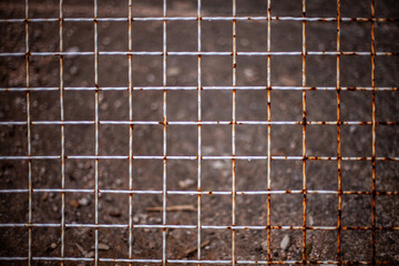 Closeup metal fence mesh grid texture