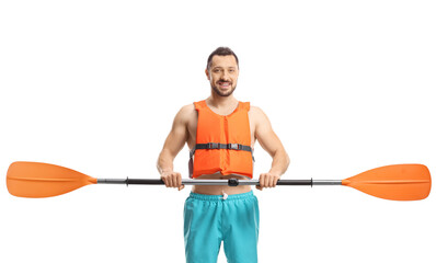 Portrait of a young man with a life vest holding a paddle