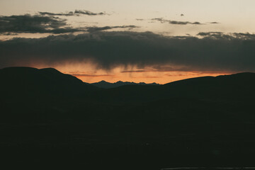 Picture of dramatic sunset in the Andes of Peru with heavy clouds. Concept of nature and climate change.