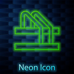 Glowing neon line Bicycle parking icon isolated on brick wall background. Vector