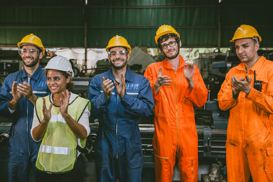 success labor people union group of technician team worker mix race man and woman happy standing clapping happy celebrate job finished