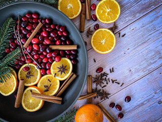 Flat lay ingredients to make home smell like Christmas with a homemade simmering Christmas...
