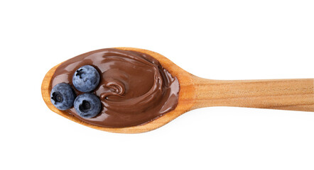 Wooden spoon with delicious chocolate paste and blueberries isolated on white, top view