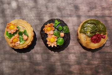 Photo of Moon Cakes on the wooden table 