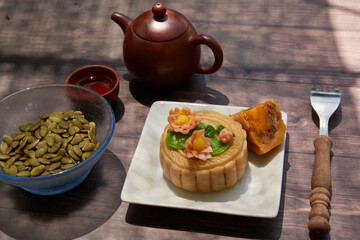 Conceptual mid-autumn festival food and drink still life.
