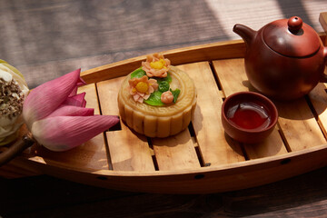 Conceptual mid-autumn festival food and drink still life.
