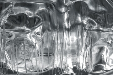 A cracked transparent block of ice.  Frozen water texture

