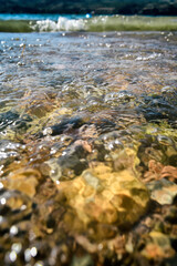 Water and rocks, Glare in the water, close-up