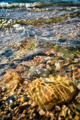 Water and rocks, Glare in the water, close-up