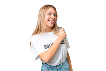 Young volunteer woman over isolated chroma key background celebrating a victory