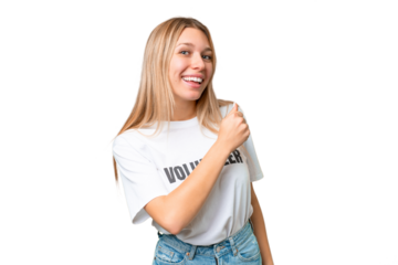 Young volunteer woman over isolated chroma key background celebrating a victory