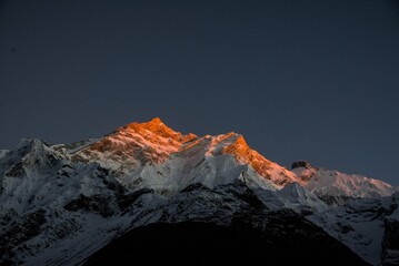 mountain peak in the snow IN NEPAL HIMALAYA 