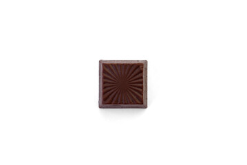 Chocolate square candy with cocoa filling isolated on a white background.