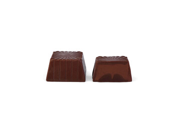 Chocolate square candy with cocoa filling isolated on a white background.