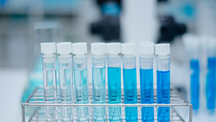 Laboratory glassware and test tubes scientific background, extensive research in science medicine, biology and biotechnology chemistry and scientific exploration. Liquid samples analyzed in test tubes