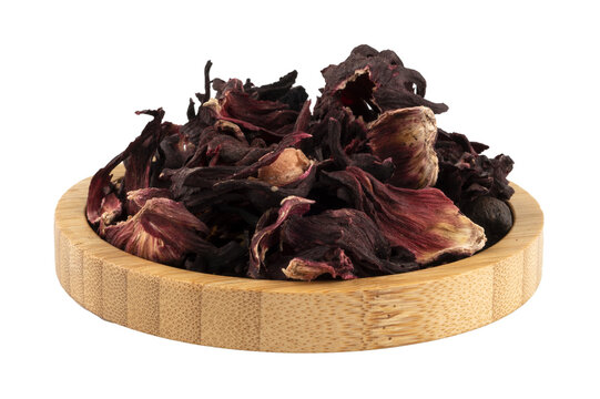 dried hibiskus in a wooden bowl