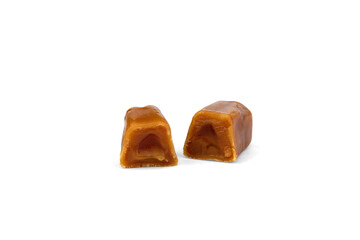 Chewable candies with fruit filling isolated on a white background.