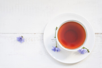Top view of a drink made from chicory roots in a cup, with space to copy. An alternative to decaffeinated coffee. High quality photo