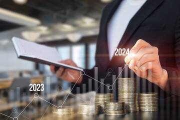 The concept of new financial achievements in the New Year 2024 .