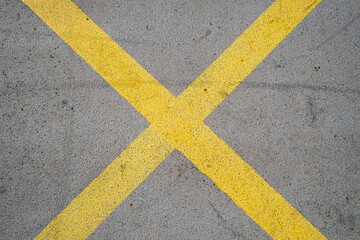 Painted yellow cross, road markings.