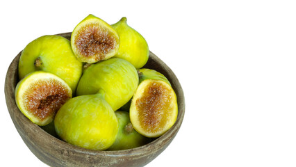 figs in wooden bowl at white background