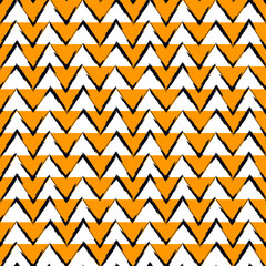 Ethnic seamless pattern. Freehand zigzag stripes print. Boho chic design background. Tribal wallpaper. Brush wavy lines. Handdrawn geometric ornament. Chevron backdrop. Indigenous image.
