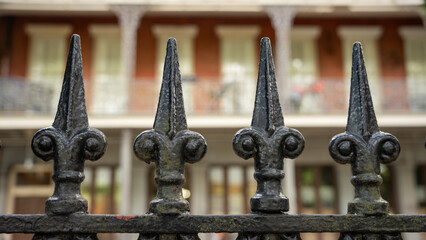 Iron fence with fancy spear like top along Jackson Square in New Orleans Louisiana .  - obrazy, fototapety, plakaty