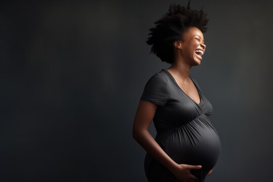pregnant woman, expecting mother profile artistic shot of pregnant black woman, african american woman pregnancy
