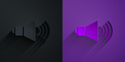 Paper cut Speaker volume, audio voice sound symbol, media music icon isolated on black on purple background. Paper art style. Vector
