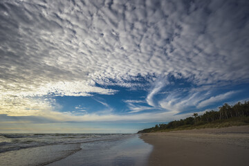 Baltic seashore with beautiful white clouds.