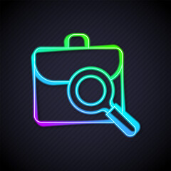 Glowing neon line Magnifying glass with briefcase icon isolated on black background. Job hunting. Work search concept. Unemployment, head hunting, career. Vector