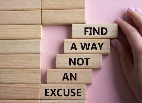 Find a Way not an Excuse symbol. Wooden blocks with words Find a Way not an Excuse. Beautiful pink background. Businessman hand. Business and Find a Way not an Excuse concept. Copy space.