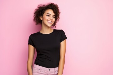 female wearing black tshirt on pastel pink background for mock up