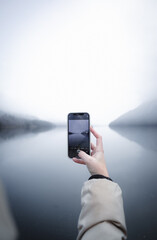 person using a phone in hand