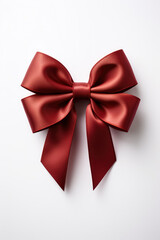 Fototapeta premium Red gift bow on whitesimple and elegant holiday decoration 