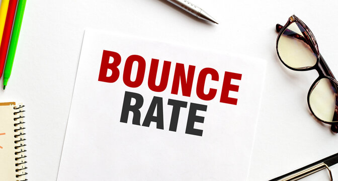 BOUNCE RATE on paper with glasses and pen