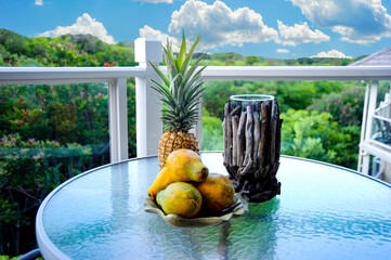 Hawaiian fruit in an arrangement on an outside table in Maui, Hawaii. 