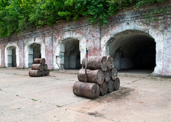 Old abandoned fort. Brick weathered, rusty walls. Location for playing Counter-Strike, airsoft, strike ball, paintball and other role-playing games. Real simulation of a computer game.