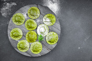 green ravioli fresh green dough  spinach, basil vegetable food meal food snack on the table copy space
