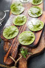 green ravioli fresh green dough  spinach, basil vegetable food meal food snack on the table copy space