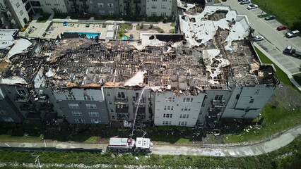 Roof of damaged apartment after burned by fire. Wide photo